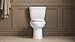 Cimarron Comfort Height® two-piece elongated 1.28 gpf toilet with AquaPiston® flushing technology and left-hand trip lever, seat not included