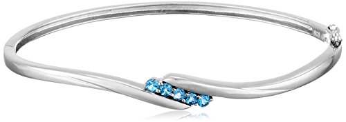 Sterling silver genuine swiss blue topaz five stone byp…