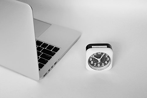 Traveler Mini Alarm Clock, Quartz Movement, Simple Modern Design, 2.5" in Diameter. Mute (Non-Ticking) Clock Hands. Built-in Light Bulb