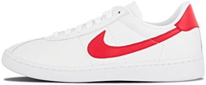 white nike bruin shoes with red swoosh