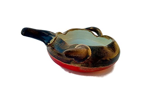 Animal-like hand thrown ashtray red and brown, with tail and horns