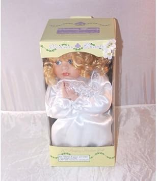 a christmas prayer porcelain doll
