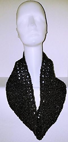 Beautiful "Black Sparkle" cowl. Spring weight yarn with silver metallic highlights. Great fashion accessory. Unique design that can also be worn as a cowl or shrug on a cool spring or summer evening.