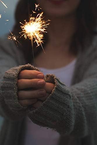 Holding a Sparkly Sparkler Journal: 150 Page Lined Notebook/Diary