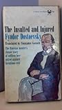 Paperback Insulted and Injured, the Book