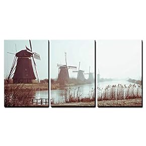 Traditional Dutch Windmills in Winter at Kinderdijk Netherlands x3 Panels