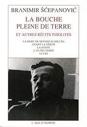 La  bouche pleine de terre