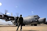 US Air Force Airman observes an MC-130H Combat
