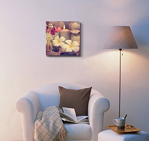 Wellness And Spa Concept With Candles Frangipani Flower Sandalwood