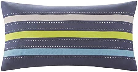 Brushed cloth decorative pillow and coverlet in ornamental design.