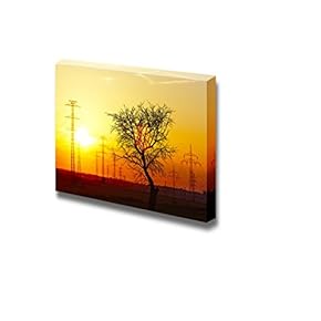 Dry Tree and Lines of Electric Power Towers Power Transmission Lines at The Sunset - Canvas Art Wall Art - 12" x 18"