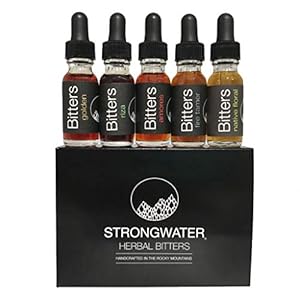 Five bottles on bitters next to eachother