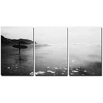 wall26 - 3 Piece Canvas Wall Art - a Man with Surf Board Standing at Beach in Black and White - Modern Home Decor Stretched and Framed Ready to Hang - 24