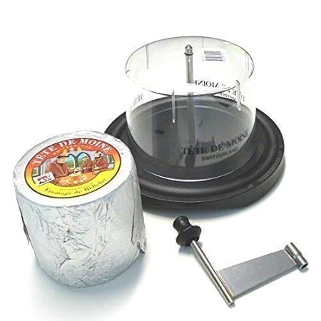 Girolle Schweizer Käsehobel Tradition mit Haube und ein ganzer Laib Tete de Moine Käse