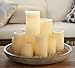 Flameless LED Candles with Wax Stain Guard Set of 9 Ivory Real Wax Battery Operated Unscented Pillar with Remote Control for On or Off Flickering or Steady Dimmer and Timer H 4