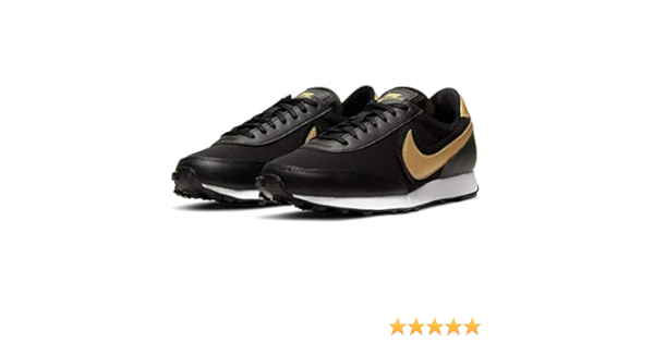 black and metallic gold nike shoes