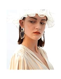 Pendientes de gota de diamantes de imitación transparentes.