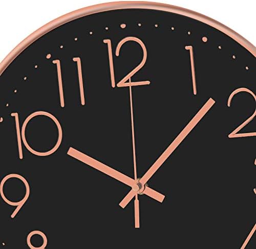 Modern wall clock with battery-operated quartz motion, high quality design, and a price of $15.99 as of August 9, 2023.