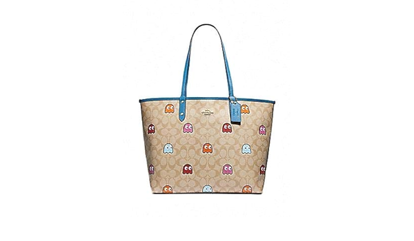 coach pac man wristlet