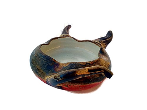 Animal-like hand thrown ashtray red and brown, with tail and horns