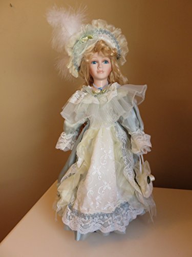 porcelain doll with blonde hair and blue eyes