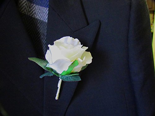 White silk rose boutonniere with cream ribbon