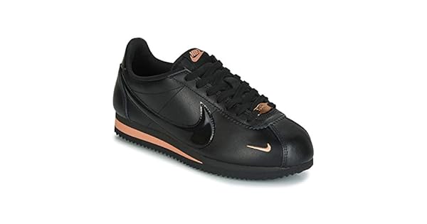 nike cortez negro y dorado
