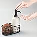 mDesign Decorative Ceramic Kitchen Sink Countertop Liquid Hand Soap Dispenser Pump Caddy with Storage Compartment - Holds Sponges, Scrubbers, Brushes - Vanilla/Cream with Bronze Metal Wire Design