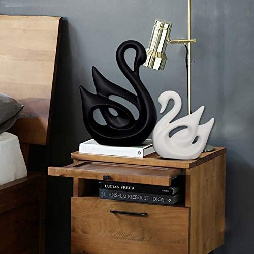 Ceramic swan sculpture priced at $27.49.