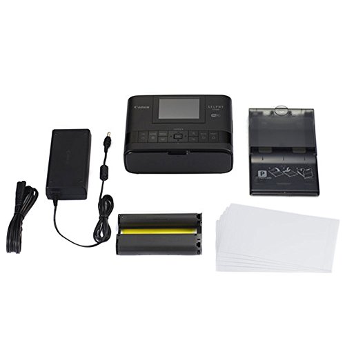 Canon SELPHY CP1300 Compact Photo Printer (Black) + Canon KP-108IN Color Ink and Paper Set + Replacement Battery + Photo4Less Cleaning Cloth - Deluxe Value Printing Bundle