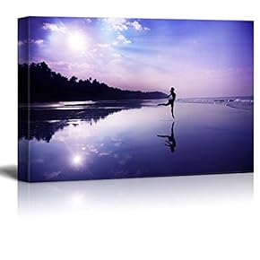 Canvas Prints Wall Art - Silhouette of a Beautiful Young Girl Dancing on The Beach at The Sunrise in Purple Colors - 12" x 18"