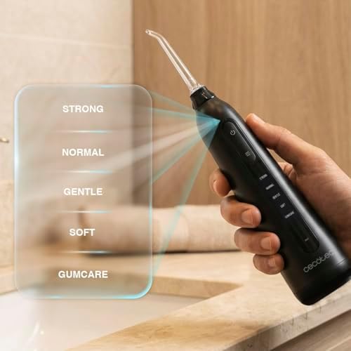 Munddusche ToothCare 6000 Jet Liberty, 180 ml, 1500 Impulse/Min, 5 Modi inkl. GumCare, 4 magnetische 360°-Düsen, IPX7 wasserdicht, 30 Tage Akku, Ladestation, Auto-Off nach 90 Sekunden