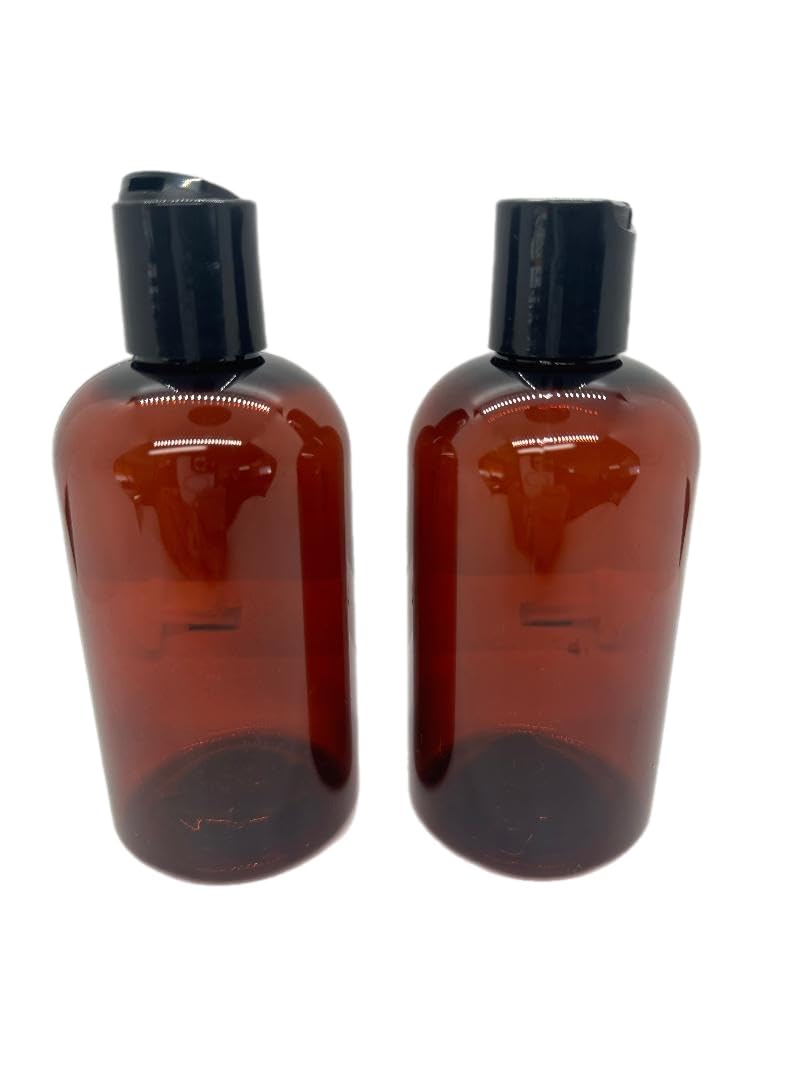 Photo 1 of Caribbean Coastal Delights 16 oz Amber Plastic Bottle with Black Disc Cap - 2 Pack - BPA-Free and Break-Resistant - Perfect for Lotions, Creams, and Beauty Essentials
