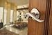 Kwikset Balboa Entry Lever featuring SmartKey® in Venetian Bronze