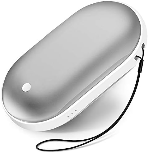 Compact hand warmer in a pocket, emitting heat.