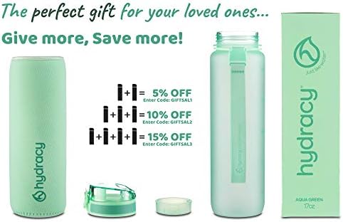 A water bottle with a built-in fruit infuser and strainer, accompanied by an extra marker.