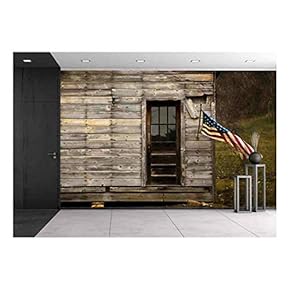 American Flag Hanging from an Old Barn with Negative Space to Display Text. - Removable Wall Mural | Self-Adhesive Large Wallpaper - 66x96 inches