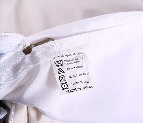 A gray quilted comforter with a geometric pattern.