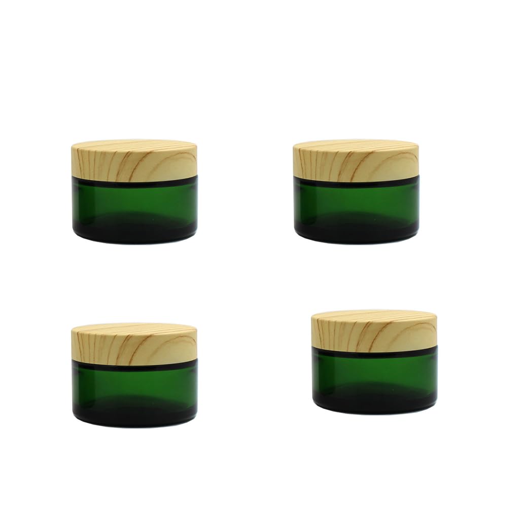 Photo 1 of 4Pack 30g 1 oz Glass Cream Jars,Green Empty Sample Jars Cosmetic Containers Pot with Wood Grain Lids for Lotion,Lip Balm,Eye Cream,Scrubs Creams,Oils Salves,Ointments (Green)