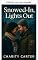 Livro Presos pela neve, luzes apagadas (Um romance inter-racial picante em cidade pequena)