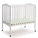 Delta Children Folding Portable Mini Baby Crib with Mattress, White primary