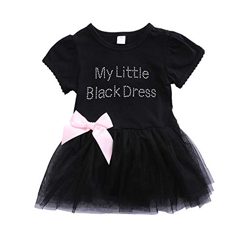 cute baby girl in black dress