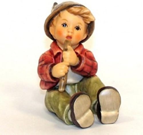hummel boy playing flute