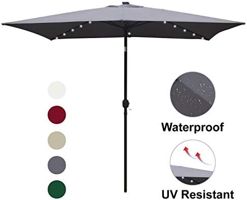 Amazon Com Abccanopy Rectangular Solar Powered Patio Umbrella Outdoor Umbrellas Tilt And Crank For Patio Deck And Pool Market Table Umbrella With 26 Led Lights 6 6 By 9 8 Ft Garden Outdoor