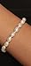 HinsonGayle AAA Handpicked 8-8.5mm White Oval Freshwater Cultured Pearl Bracelet Sterling Silver-7.5 in length