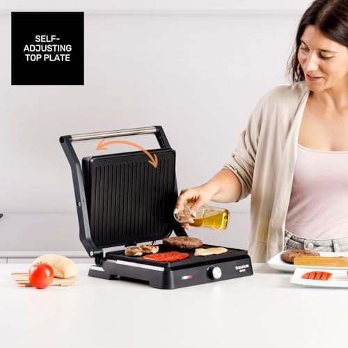 - Grelhador Bistro 2600W | 2-em-1: Grelha e Chapa | Lajes de 29x23 cm | Placa inclinável e abertura a 180º | Revestimento Antiaderente Livre de PFOA | Bandeja de Gordura | Termóstato Ajustável