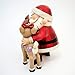 Enesco Jim Shore Santa Hugging Rudolph & Clarice Figurine, 4.9