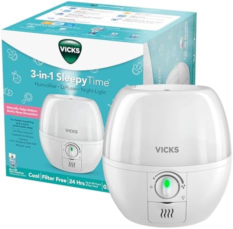 Vicks 3-in-1 SleepyTime Humidifier, No. 1 Brand Recommended by Pediatricians*. Cool Mist Humidifier with Night-Light, and Essential Oil Diffuser for Baby and Kids rooms. Visible Cool Mist, White.