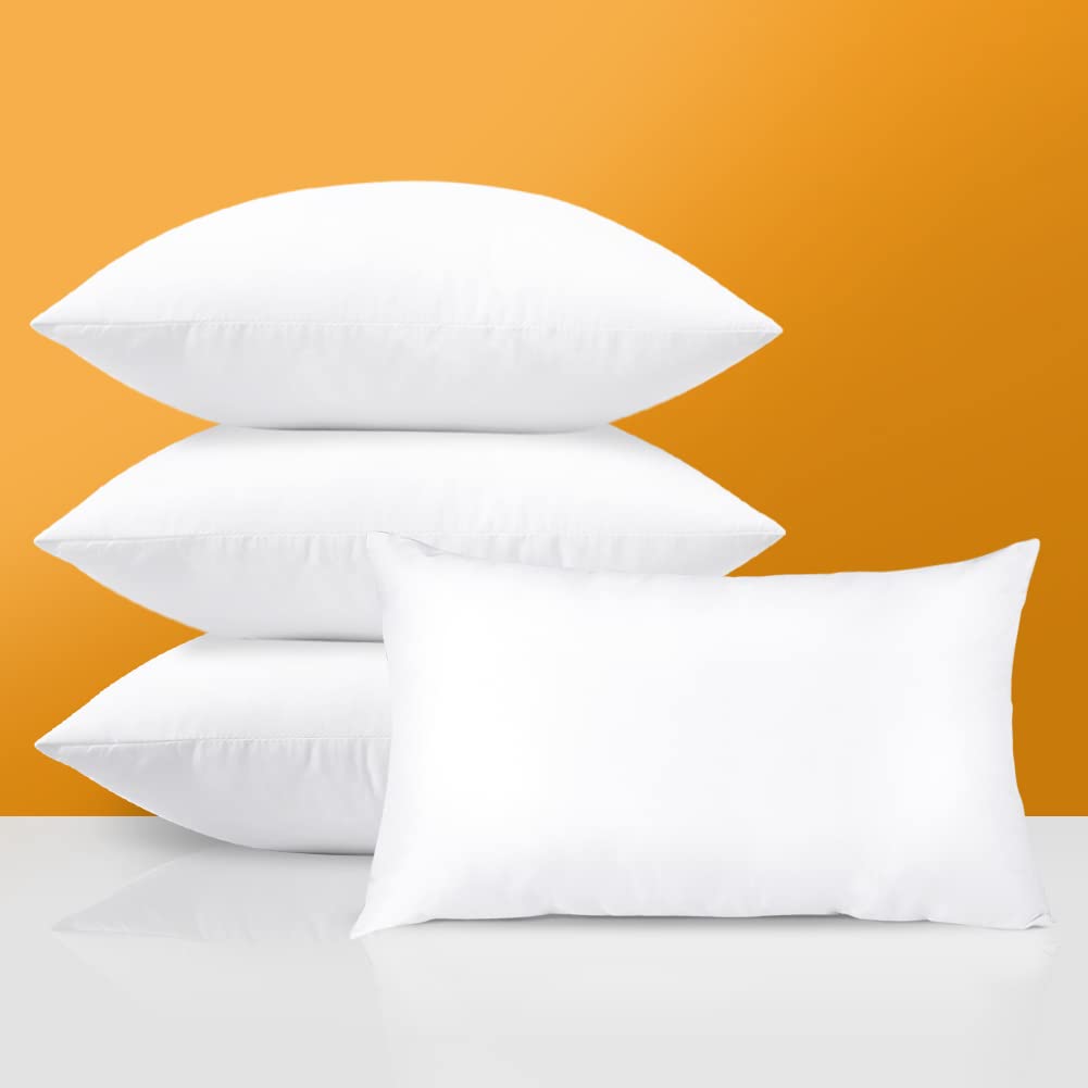 Photo 1 of OTOSTAR 12 x 20 Pillow Inserts Set of 4 Outdoor Waterproof Decorative Throw Pillow Inserts Rectangle Lumbar Pillow Stuffers Form for Patio Couch Bed Garden Pillows Cushion (12 x 20 Inch)
