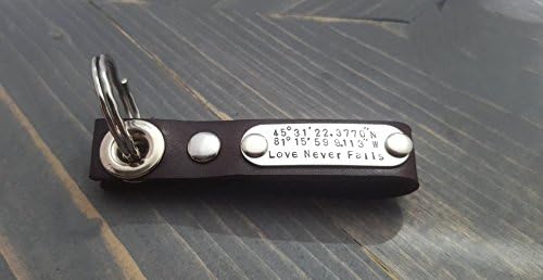 Leather and Stainless Steel Key Chain. Personalized with your own text. with 18 characters per line. Rugged and Sturdy Key Chain. Makes an awesome Valentine's Day gift.